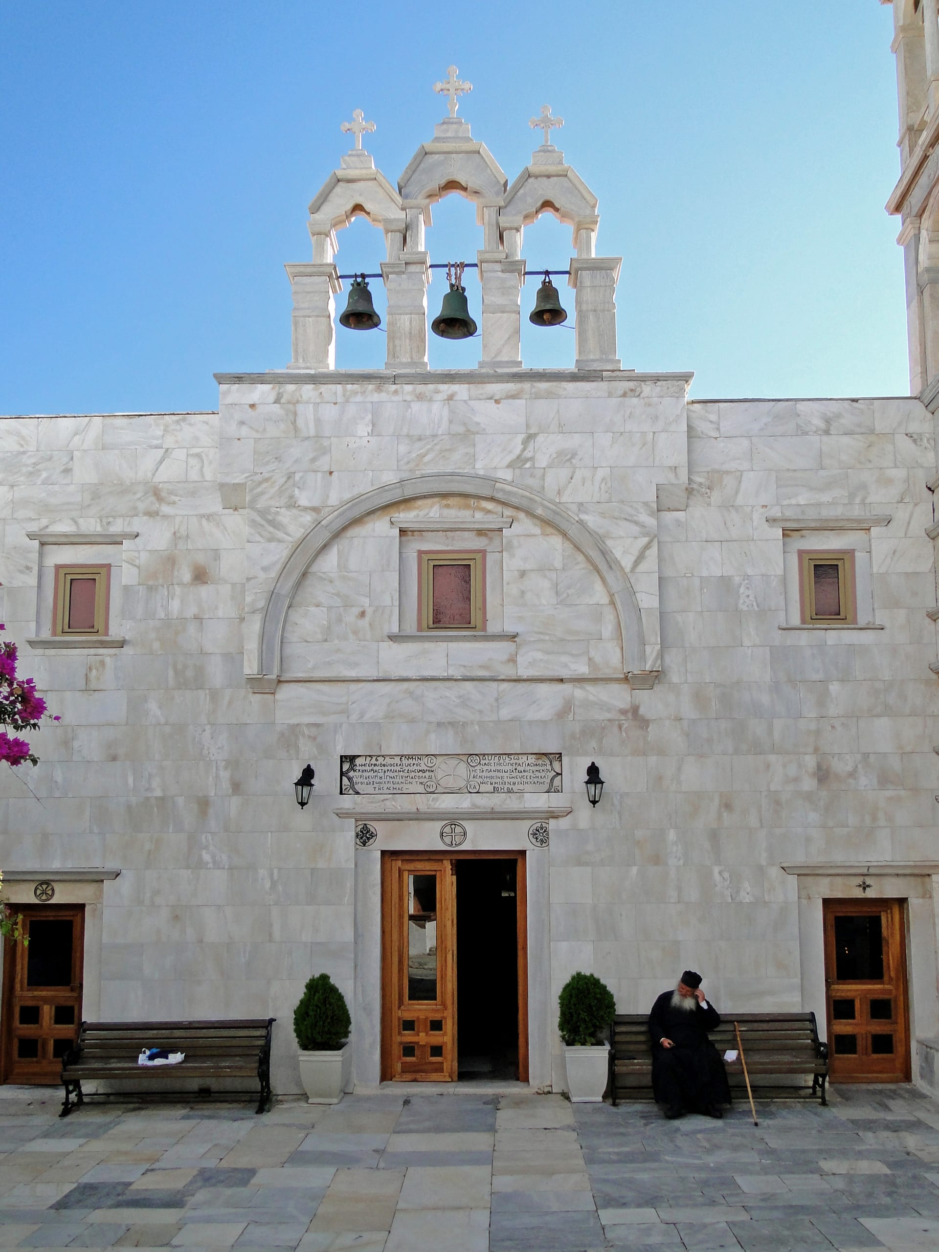 Marble bell tower of Panagia Tourliani monastery in Ano Mera