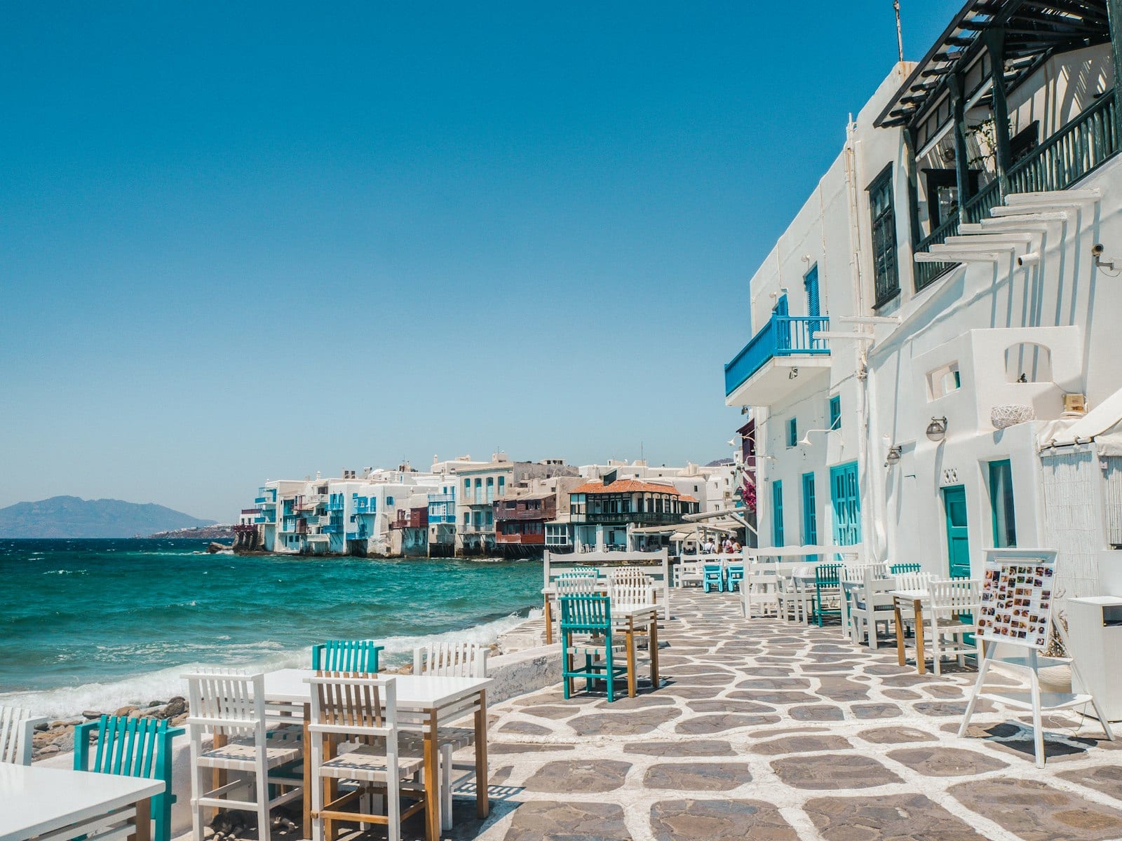 Colourful balconies of Little Venice hanging over the Aegean