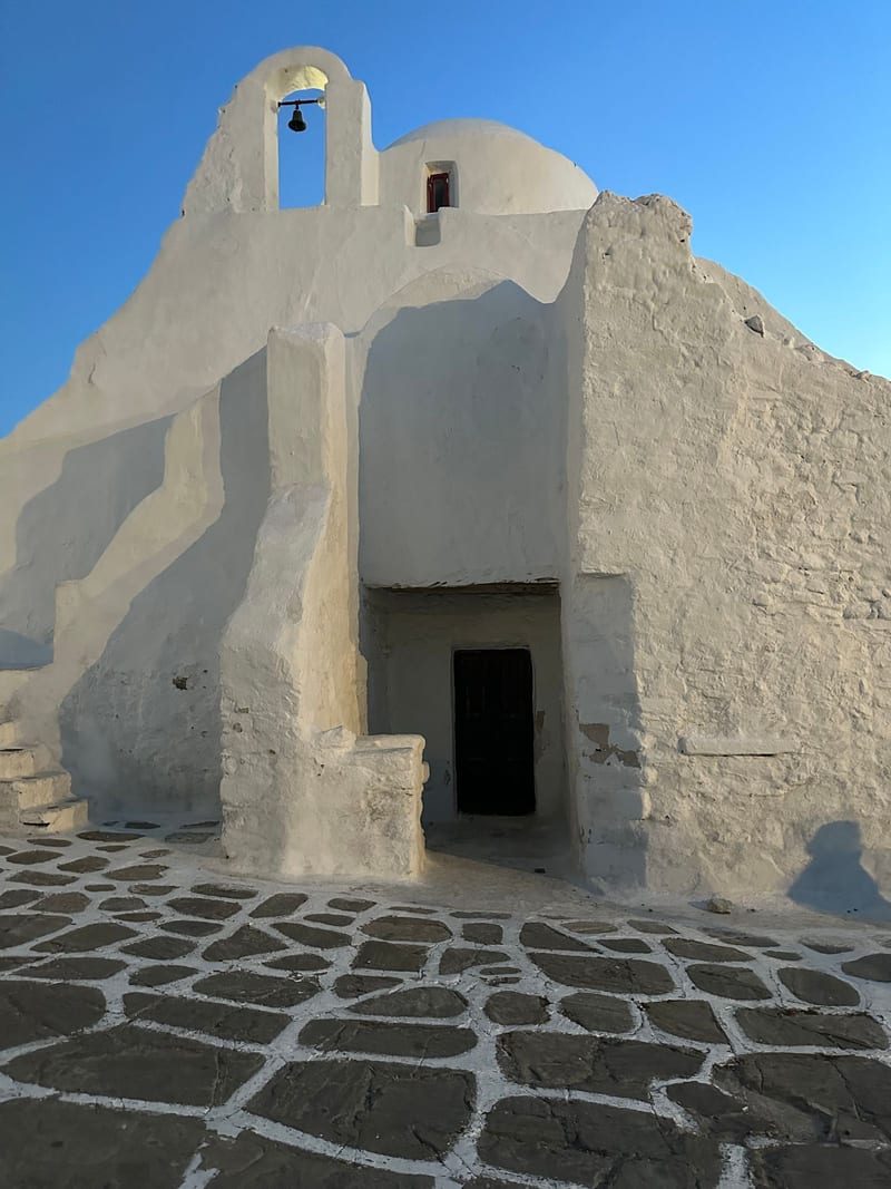 Whitewashed Panagia Paraportiani church complex in Mykonos Town